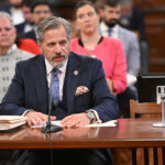 State Senator Robert Martwick addresses a committee.